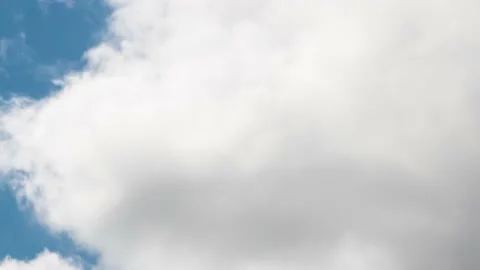 Clouds in the sky - Time lapse video background - 4K 30p Stock Footage 130871665