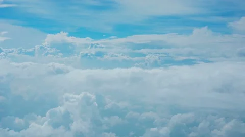Clouds in the sky - view through glass of aircraft window Stock Footage 40975507