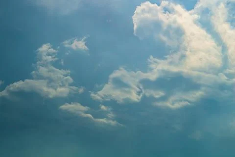Clouds with slight haze and selective focus on bluish sky. Blurry, cloudy w.. 写真素材