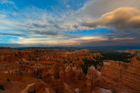 Clouds slowly drift over beautiful Bryce Canyon wilderness, revealing scenic  Stock Photos