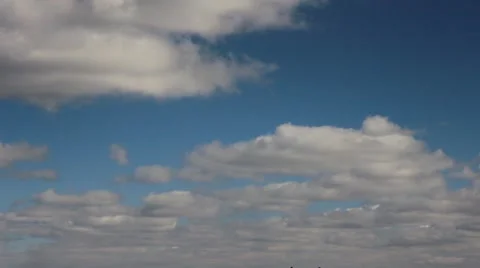 Clouds slowly float in the winter sky Stock Footage 48266455