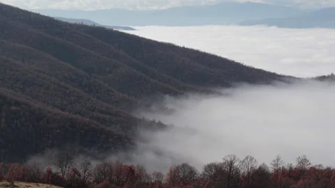 Clouds slowly moving on the side of the mountain, Full HD 1080 Cinematic Stock Footage 146914972