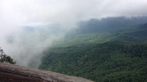 Clouds slowly moving through mountains in Asheville, North Carolina Stock Footage 75944242