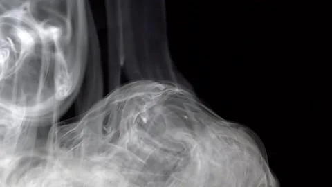 Clouds of smoke on a black background Stock Footage 159436022