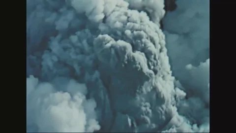 Clouds of smoke erupting after an volcanic explosion - 1980 Stock Footage