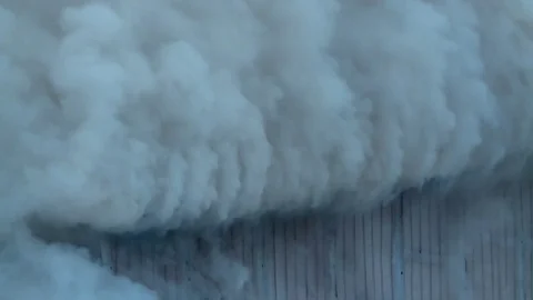Clouds of smoke. Fire. Flame. Extinguishing the fire. Stock Footage 72913083