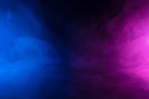 Clouds on smoke in neon light on dark scene Stock Photos