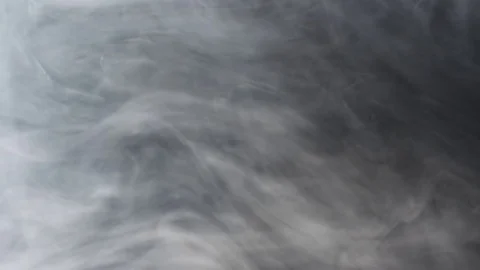 Clouds of smoke squirling in space and moving slowly to the left side Stock Footage 83992323