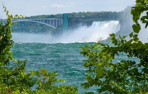 Clouds of splashes and falling water from Niagara Falls, Niagara State Park.. Stock Photos