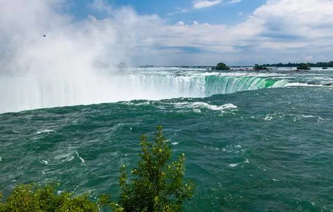 Clouds of splashes and falling water from Niagara Falls, Niagara State Park.. 写真素材