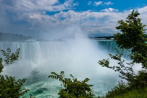 Clouds of splashes and falling water from Niagara Falls, Niagara State Park Stock Photos