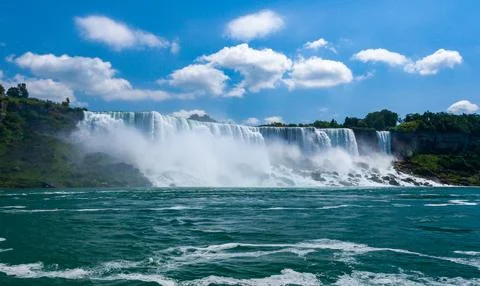 Clouds of splashes and falling water from Niagara Falls, Niagara State Park Фото