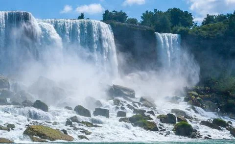 Clouds of splashes and falling water from Niagara Falls, Niagara State Park 写真素材