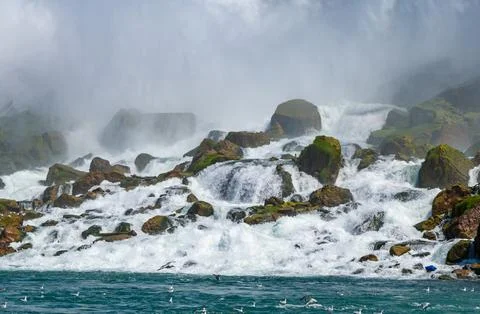 Clouds of splashes and falling water from Niagara Falls, Niagara State Park Stock Photos