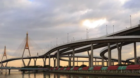 Clouds spread across the sky before sunset at Bhumibol Bridge Stock Footage 71325893