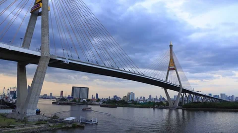 Clouds spread across the sky before sunset at Bhumibol Bridge Stock Footage 71442904