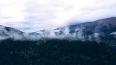 Clouds spread over the mountains of Arkhyz, tilt-shift Stock Footage 98122259