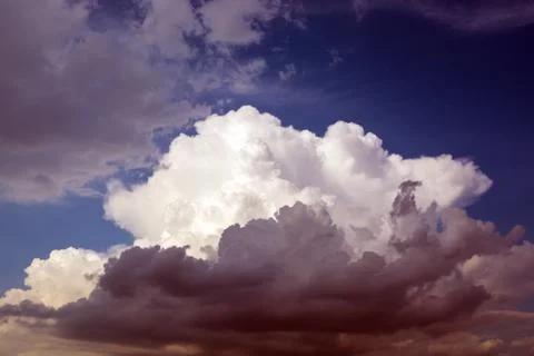 Clouds before the storm are approaching the clear sky 写真素材