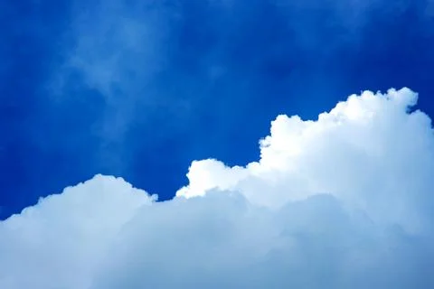 Clouds before the storm. Blue sky with huge clouds Stock Photos