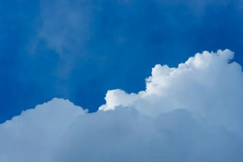 Clouds before the storm. Blue sky with huge clouds Stock Photos