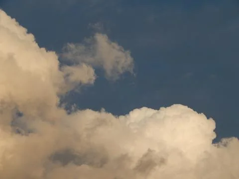 Clouds of a storm over the city float Stock Photos