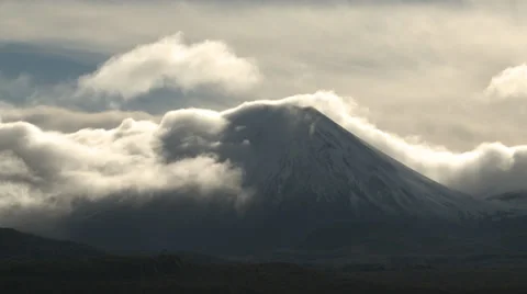 Clouds stream over mountain top time lapse Stock Footage 38958041