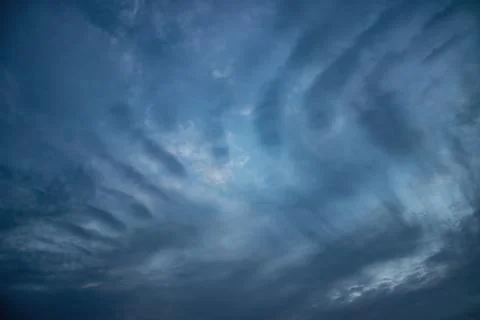 Clouds structure in the night sky. Stock Photos
