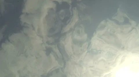 Clouds, sun and sky seen from undewater Stock Footage 36585025