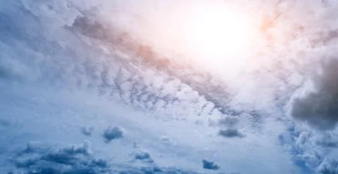 Clouds sun background Stock Photos