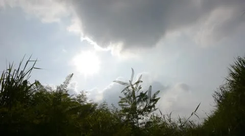 Clouds Sun Grassy Foreground Time Lapse 01 Stock Footage 8966268