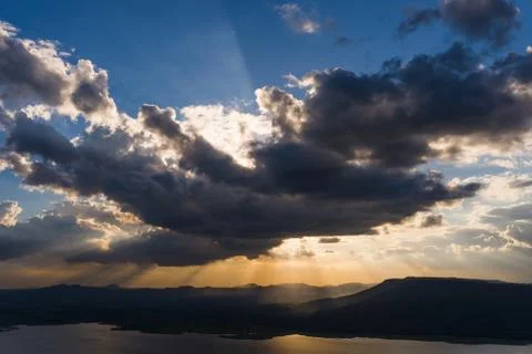 Clouds sun ray Stock Photos