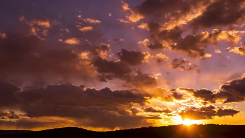 Clouds sun rays 4K, moving through timelapse sunshine, sunset sky time-lapse Stock Footage 150915636