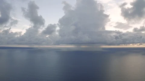 Clouds in sunlights over the Ocean next to Bali Island 4K Drone shot Stock Footage 119335331