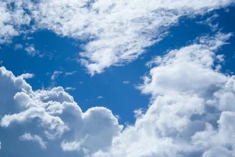 Clouds on sunny day Stock Photos