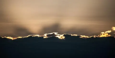 Clouds, sunrays, light Stock Photos