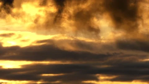 Clouds at sunrise with dark smoke - sky in Real Time - Cloudscape - Background Stock Footage 143244148
