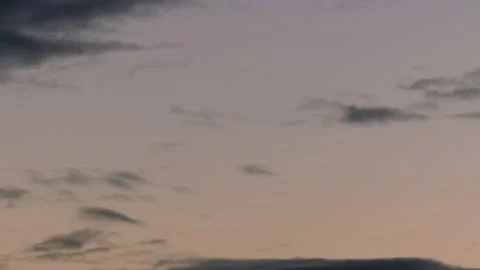 Clouds at sunrise with flying birds - sky background - real time Stock Footage 143258290