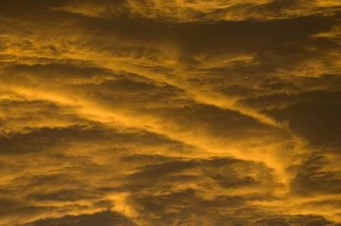 Clouds at sunrise Stock Photos