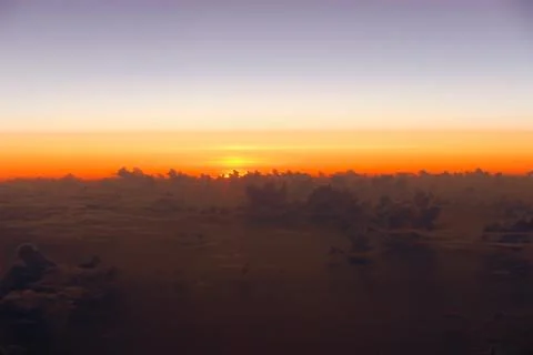 Clouds sunset from airplane Stock Photos