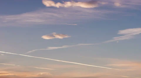 Clouds at sunset airplane trail HD 스톡 동영상 33979601