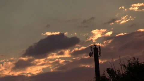 Clouds sunset and communication tower Video stock 137657102