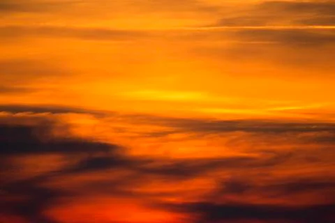 Clouds at sunset, a background Stock Photos