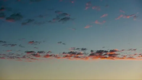 Clouds at sunset dissolve and leave Video stock 77477003