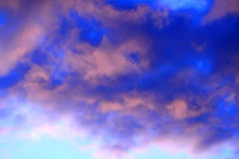 Clouds at sunset in early spring Stock Photos