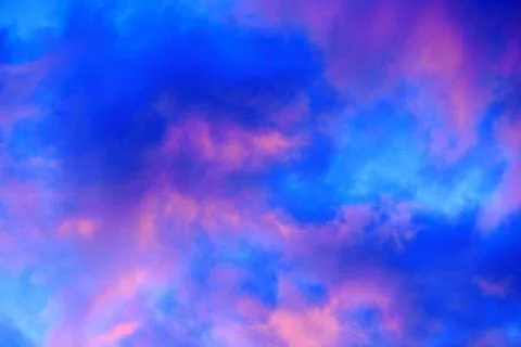 Clouds at sunset in early spring Stock Photos