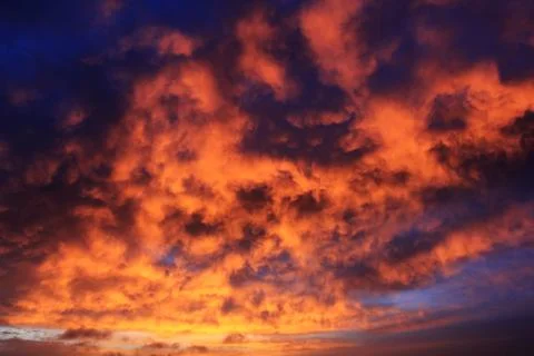 Clouds in sunset with fire color. Stock Photos