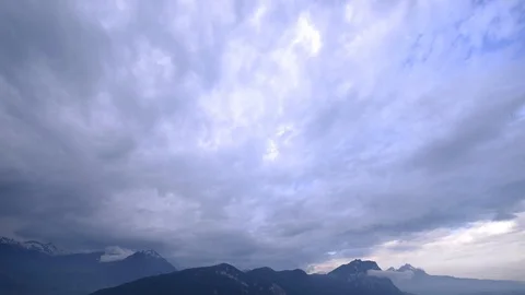 Clouds at sunset. Mountain peaks Pilatus and Burgenstock Stock Footage 110787360