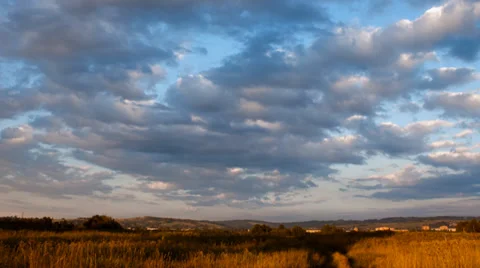 Clouds sunset over field Stock Footage 36763198