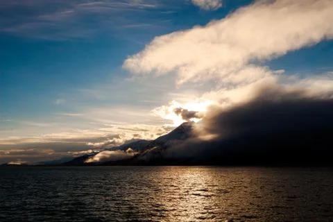 Clouds at sunset Stock Photos