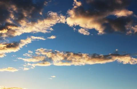 Clouds at sunset Stock Photos